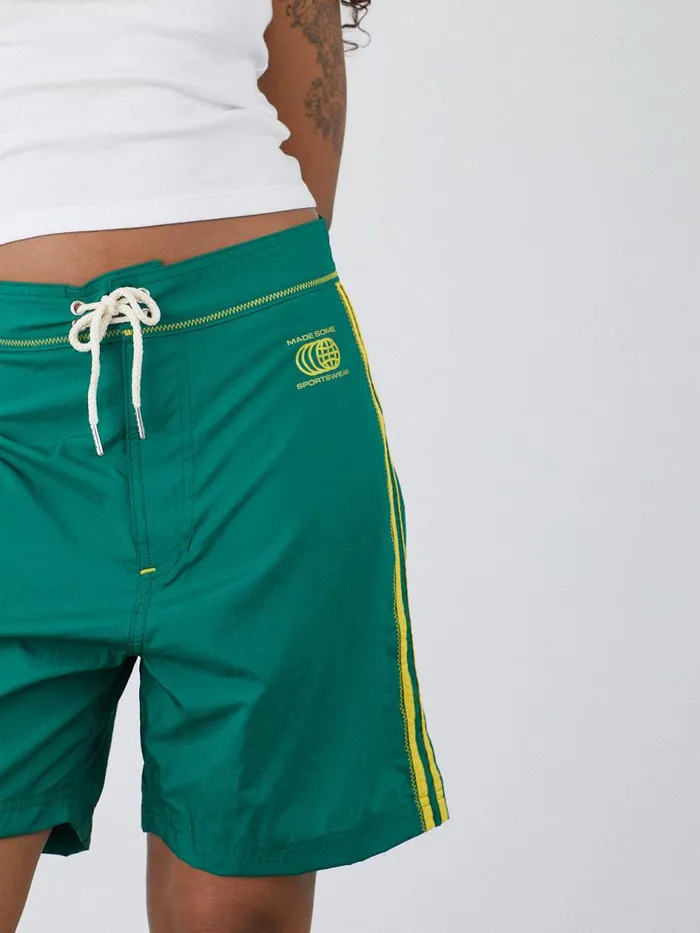 Women Made Some Long Shorts Green and Yellow Lisa Says Gah Shorts